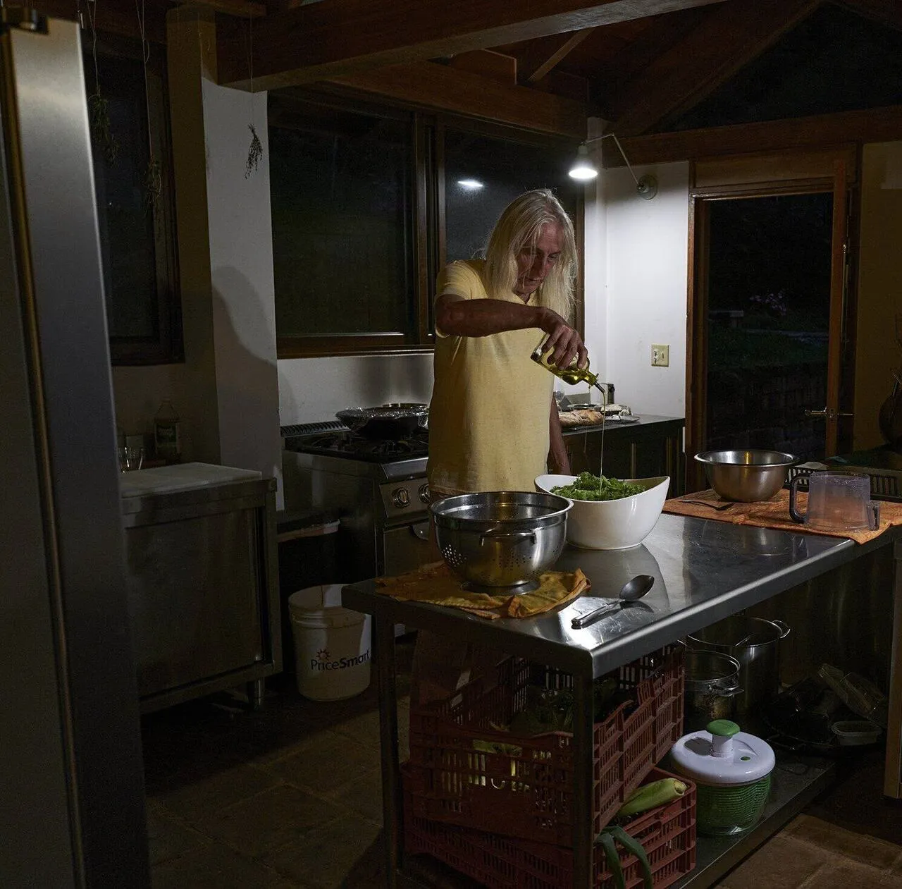 The cook preparing a meal in the farm kitchen