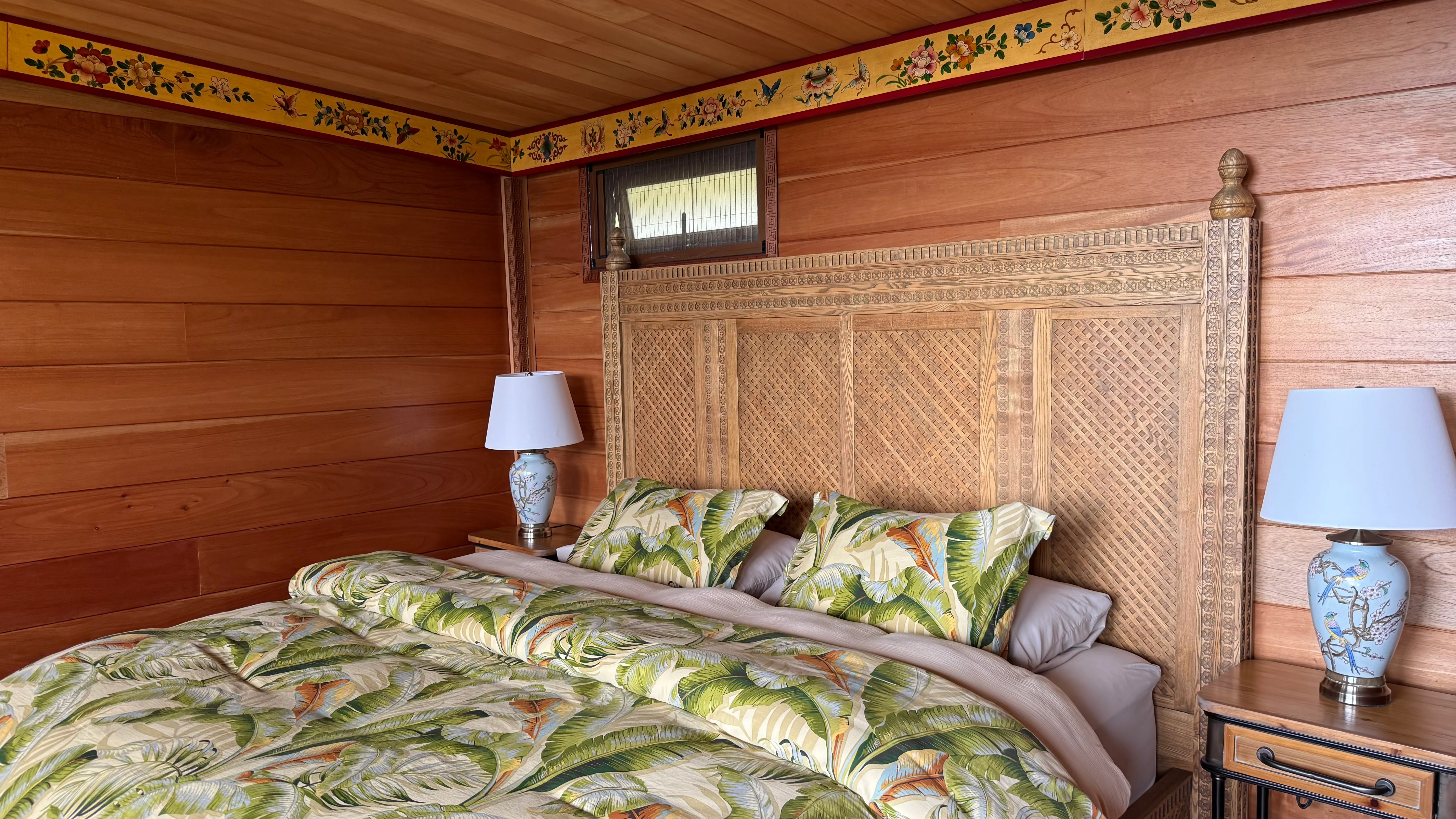 Cabin Jaguar hand-carved headboard detail