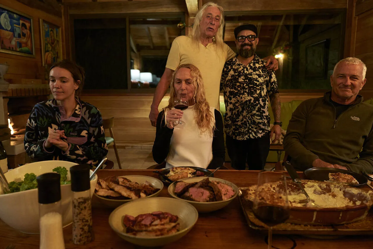 Guests sharing a meal at the communal table