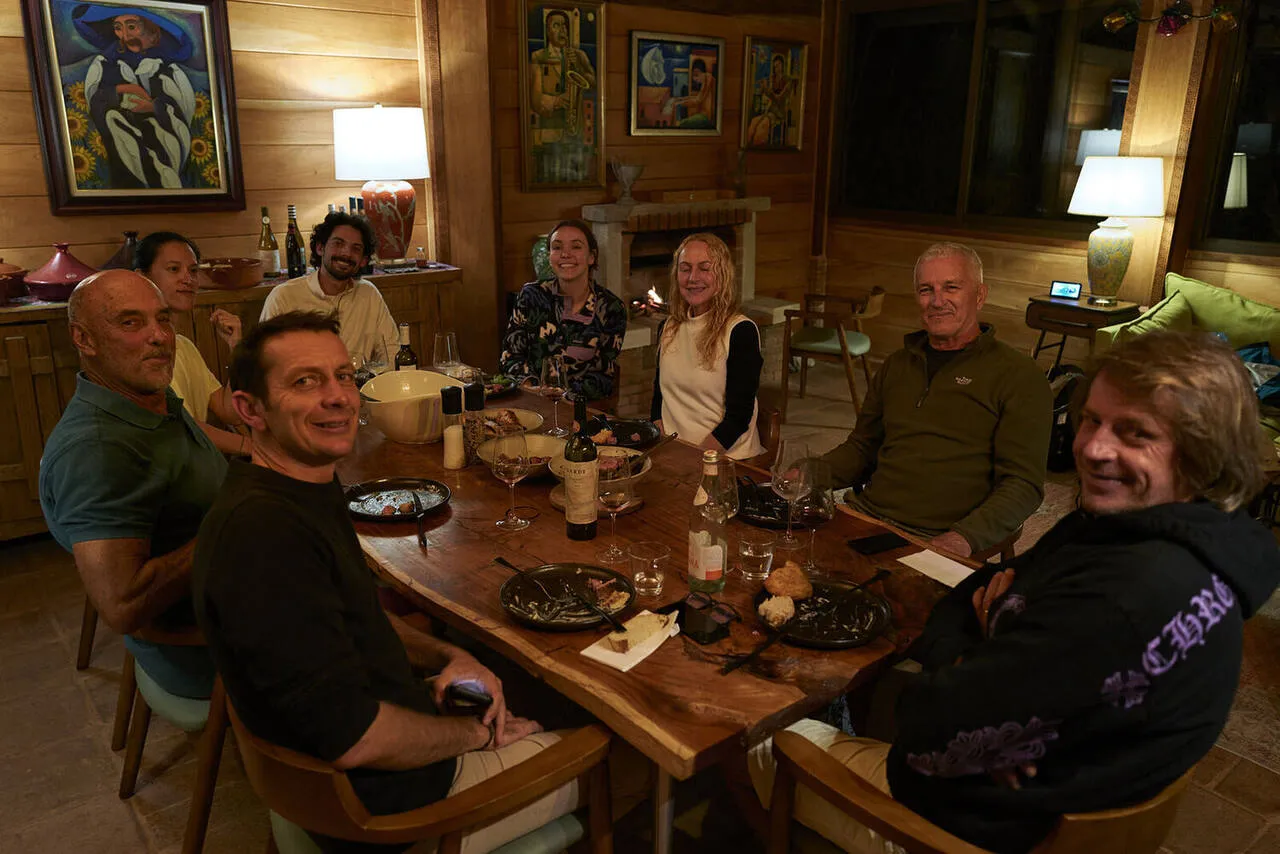 Guests seated together at the communal table